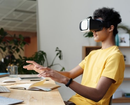 Young man using VR headset